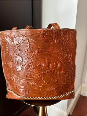 Patricia Nash Tooled Floral Leather Tote and matching pouch in Cognac Brown